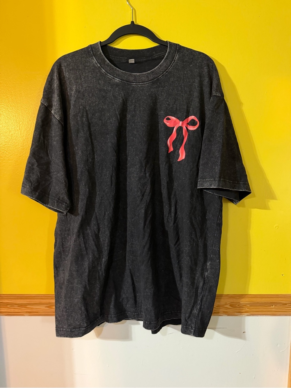 Black Short-Sleeve Women's Tee with Pink Bow Accent